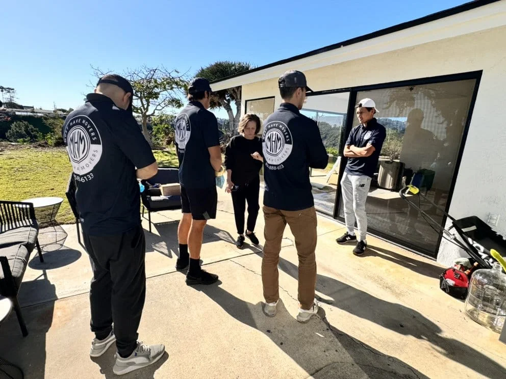 Must Have Movers crew loading boxes during a San Diego County move
